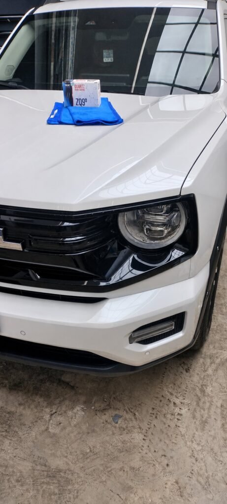 Full car body painting in Dubai — white SUV front bodywork at Wrapex Car Care